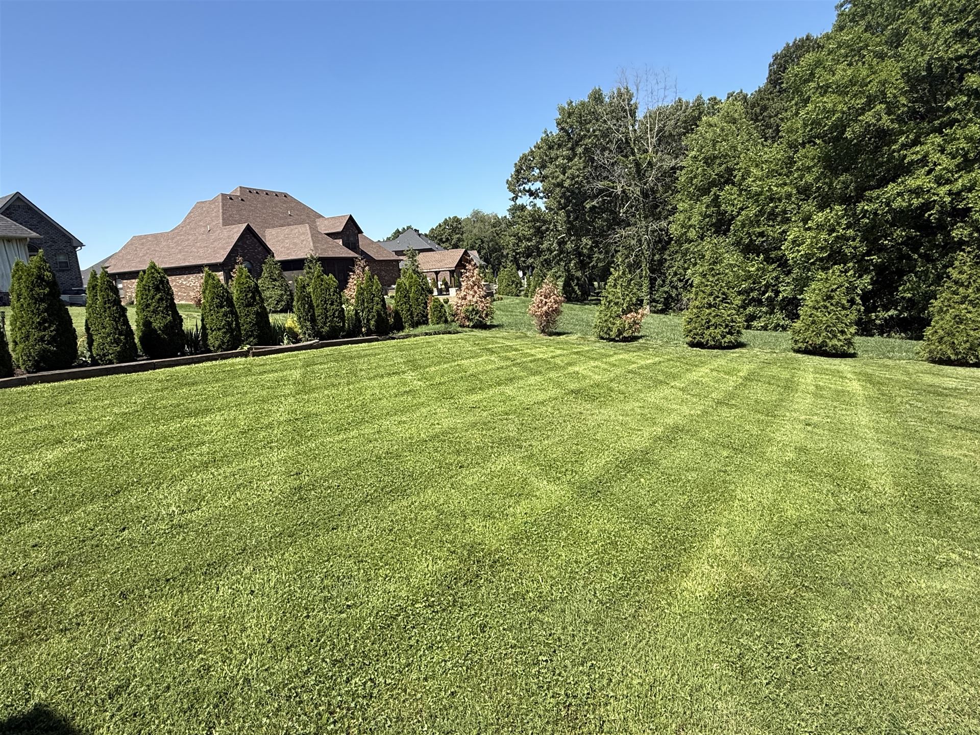 Big Chief lawn mowing at upscale property with landscaping in South Central Kentucky